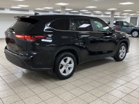 The citys lights ripple across wet pavement as the Midnight Black Metallic finish glides past, its L... (image 5)