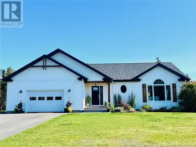 Charmante propriété situé au 321 Chemin Guignard à Petite-Lamèque. Une maison avec cinq chambres à c...