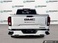 The 2026 GMC Sierra 1500 Elevation in a striking White finish is the perfect combination of power an... (image 5)