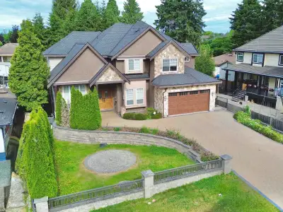 Welcome to this stunning custom-built 8bed, 8bath home located in prime East Newton on a 9,499 sq ft...