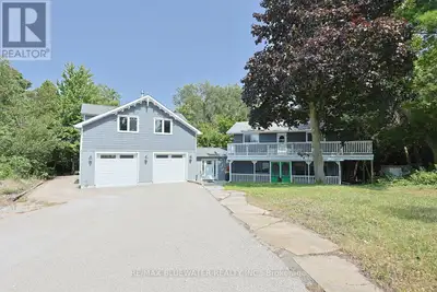 Welcome to your own piece of paradise just steps to the sandy shores of Lake Huron in Port Franks! T...