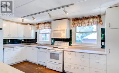 A bright three-bedroom apartment in one of midtown Toronto's most walkable pockets. Shutters frame t...