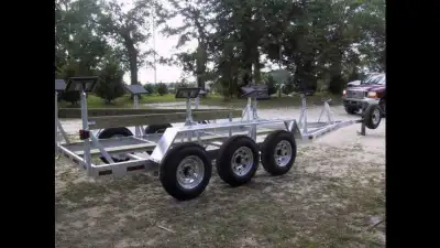 Tri-axel sailboat trailer 10500 axle rating 9000lb capacity $6999 with 6 pads keel runner and guides...