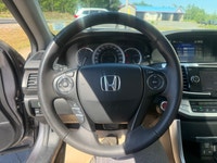 a refined midsize sedan. As an upper-tier trim, it features a leather-trimmed interior, heated front... (image 9)