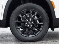 The 2026 Chevrolet Traverse LT AWD stands out in a bold White finish that complements its wide, athl... (image 3)