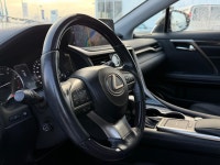 The RX 350 is defined by its "floating roofline" design and the signature Lexus spindle grille. With... (image 4)