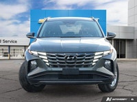 The expansive panoramic sunroof of this 2023 Hyundai Tucson Preferred offers breathtaking views, tra... (image 1)