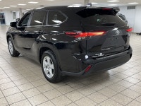 The citys lights ripple across wet pavement as the Midnight Black Metallic finish glides past, its L... (image 3)