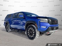 Awarded a 2024 IIHS Top Safety Pick, this striking blue 2024 Nissan Frontier Crew Cab Pickup excels... (image 8)