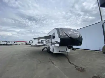EAST TO WEST Tandara half-ton fifth wheel 22RK highlights: Rear Kitchen Front Private Bedroom Theate...