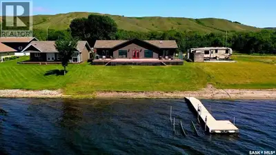 BEACHY AND EARTHY VIBE...MODERN WATERFRONT LAKE HOME with 1680 sq ft, double detached garage (28' x...