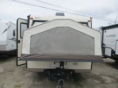 Room to sleep seven with triple tent ends having heated queen mattresses and a fold down dinette . O...