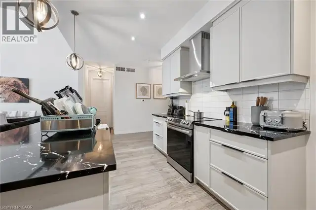 972 STONECLIFFE Walk Unit# 18 Kitchener, Ontario in Houses for Sale in Kitchener / Waterloo - Image 12