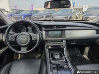 This 2016 Jaguar XF Prestige is powered by a refined 3.0L supercharged V6 engine paired with a smoot... (image 9)
