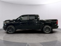 Experience the power and versatility of the new 2026 Ram 1500 Warlock in a striking black finish. Th... (image 1)
