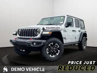 This Jeep Wrangler has a dependable ERC 3.6L Pentastar(TM) VVT V6 engine w/ESS engine powering this...