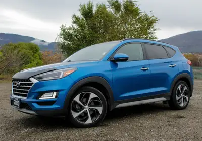 The 2020 Hyundai Tucson Ultimate AWD in a striking blue finish is a harmonious blend of power and so...