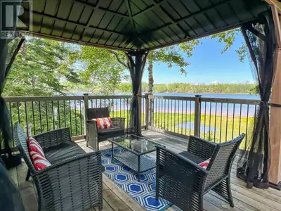 Welcome to this beautifully renovated 2-bedroom waterfront cottage, offering the perfect blend of mo...