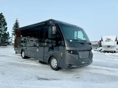 Coachmen Euro Class A gas motorhome 25TB highlights: Spacious Full Bath Induction Cooktop Recliners/...