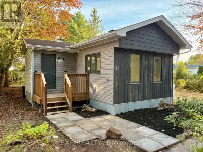 Welcome to this RENOVATED 3 bedroom MOBILE HOME in the tranquil setting of Larose Forest Mobile Home...