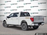 Introducing the 2026 Ford F-150 Tremor, dressed in a stunning white exterior and equipped with a rob... (image 4)
