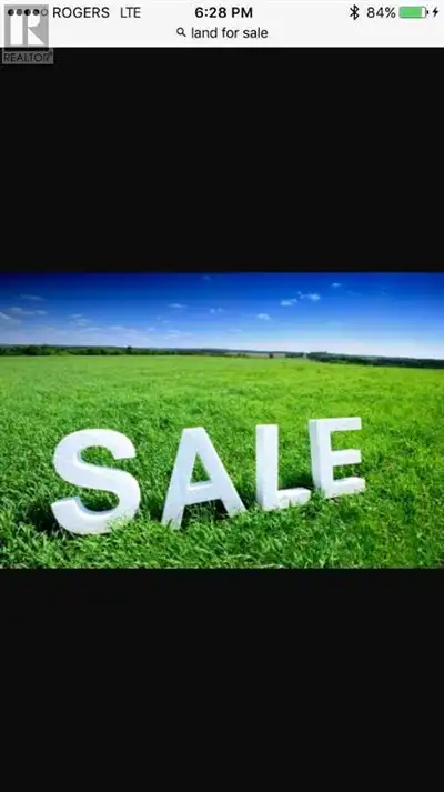 Great opportunity to own land only 4 miles from Airdrie. Paved road to property, Excellent building...