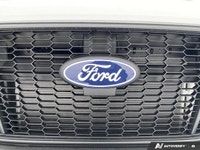 Introducing the 2026 Ford Transit Cargo Van, a powerhouse wrapped in a pristine White exterior and e... (image 8)