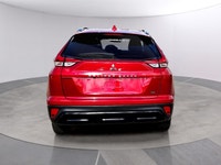 The 2026 Mitsubishi Eclipse Cross NOIR S-AWC, clad in a striking red exterior, combines the robust h... (image 3)