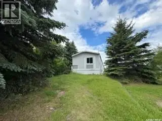 On a quiet street in the town of Dorintosh you will find this modern mobile home that backs onto gre...