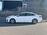 This 2020 Ford Fusion offers a perfect balance of style, comfort, and efficiency, making it an ideal... (image 1)