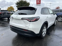 The pristine Platinum White Pearl exterior of this 2024 Honda HR-V LX-B instantly captivates. With j... (image 4)