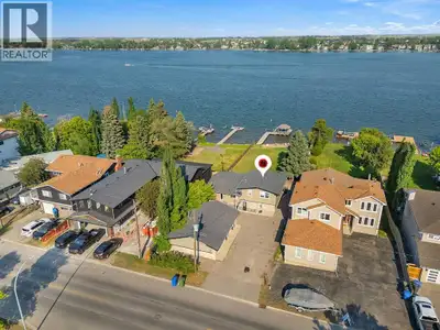 LAKEFRONT LUXURIOUS PROPERTY!! OVER 18,000 SQ FT LOT (60 FT X 301 FT) WITH PRIVATE DOCK!! 4 BEDROOMS...