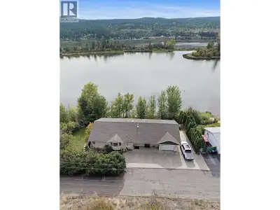 Lakefront living on beautiful Williams Lake! Custom built home once owned by local legend Rudy Johns...