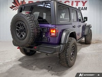 This Jeep Wrangler boasts a Gas/Electric V-6 3.6 L/220 engine powering this Automatic transmission.... (image 4)