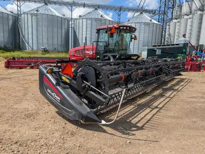 2015 Macdon M155 Windrower Swather. Engine HRS: 1,106 Header HRS: 803 Cab suspension Cummins Engine...