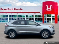 Command the road and embrace adventure in this sophisticated 2023 Ford Edge SEL, striking in Silver.... (image 6)