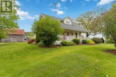 Visit REALTOR® website for additional information. Charming 5-bedroom farmhouse on 2.77 peaceful acr...