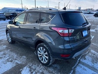 Titanium 4WD, Ultra Low Km's, Leather Heated p/Seats, Panoramic Roof, 2.0L, Navigation, Remote Start... (image 1)