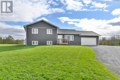 Enjoy the peace and privacy of country living in this stunning 3-bedroom, 3-bath home set on a beaut...