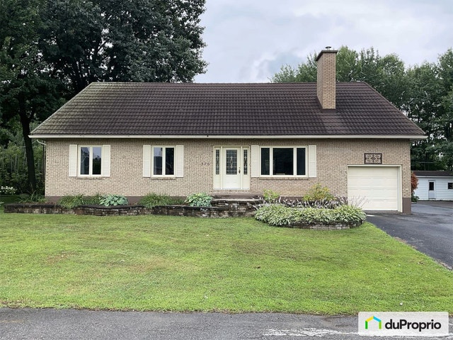 $475,000 - Bungalow for sale in Nicolet — photo 1