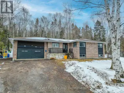 Welcome to this sprawling family bungalow with ample square footage for the growing or blended famil...