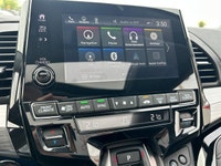 Engineered for memorable family journeys, this 2024 Honda Odyssey Touring in sophisticated Modern St... (image 8)