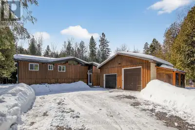 Fantastic chalet style home with 4 bedrooms & 2.5 half baths on approx. 2.24 forested acres with a 2...