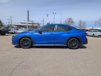 The pre-owned 2023 Subaru WRX Sport-Tech in WR Blue Pearl with a Black Alcantara interior delivers e... (image 2)