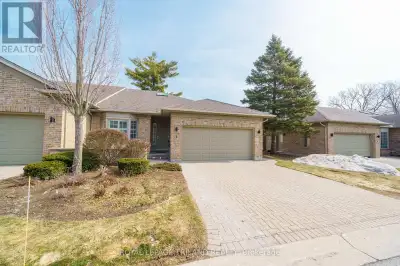 Welcome to 1151 Riverside Drive, Unit 5 - This executive 2-bedroom bungalow condo located in highly...