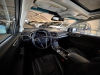 Stock#: 260167AThe 2019 Ford Edge Titanium AWD is a mid-size, five-passenger crossover SUV that sits... (image 6)