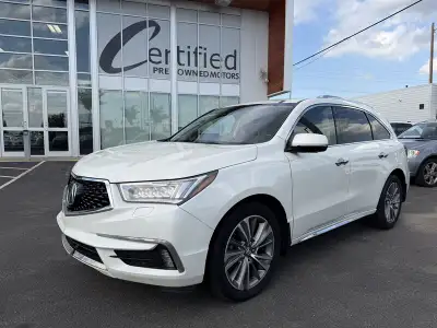 Experience luxury, performance, and premium family versatility with this 2017 Acura MDX SH-AWD Elite...