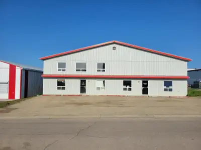 Office and Shop space for rent. This unit is 2048 sq.ft. The rear shop space is 30 x 40' plus a 2 pi...