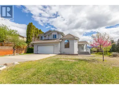 Lovely views of Okanagan Lake from this two-storey home, nestled in the quiet subdivision of Sumac R...