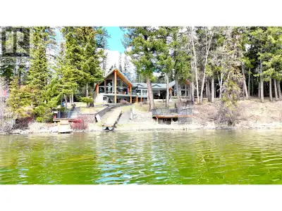 Set on 3.3 acres of private south-facing waterfront on Bridge Lake, this property offers over 5,000...